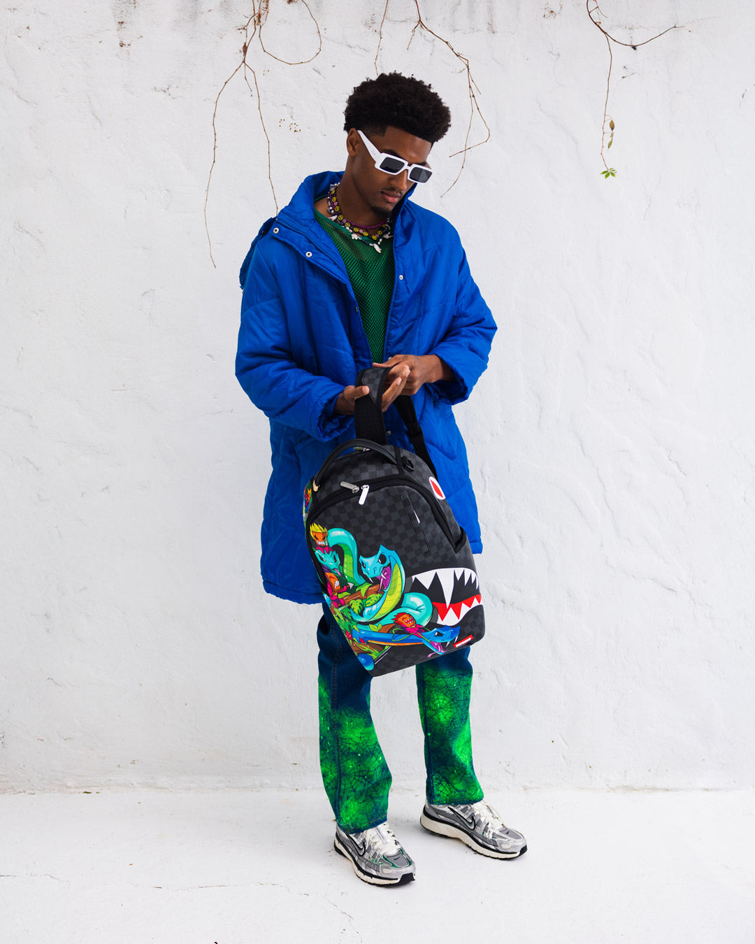 Sprayground - حقيبة ظهر فرقة تجمع