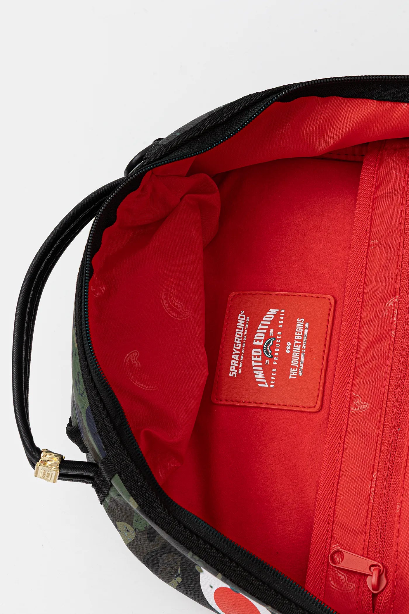 Sprayground - حقيبة ظهر Camo Splash Dlxsv