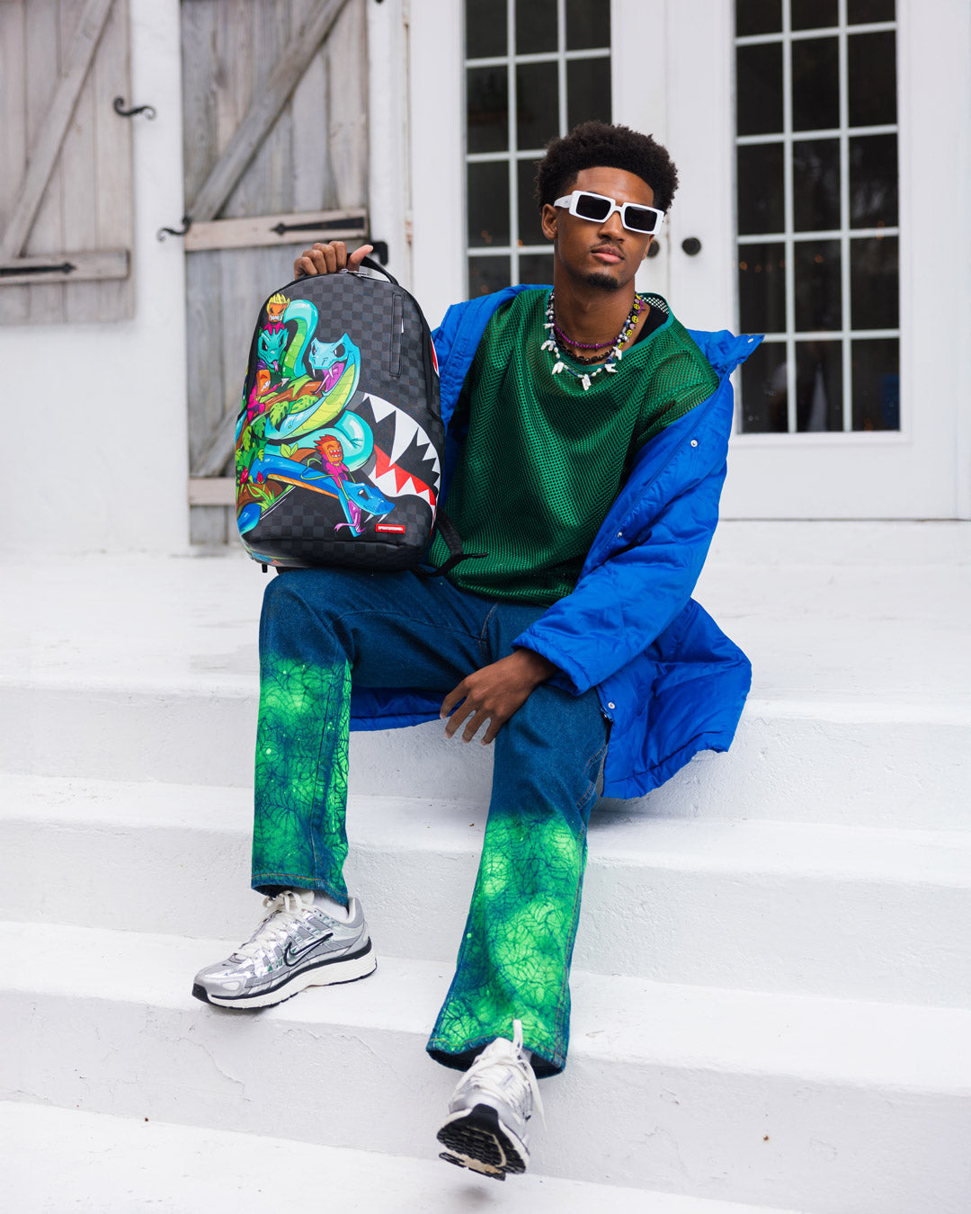 Sprayground - حقيبة ظهر فرقة تجمع